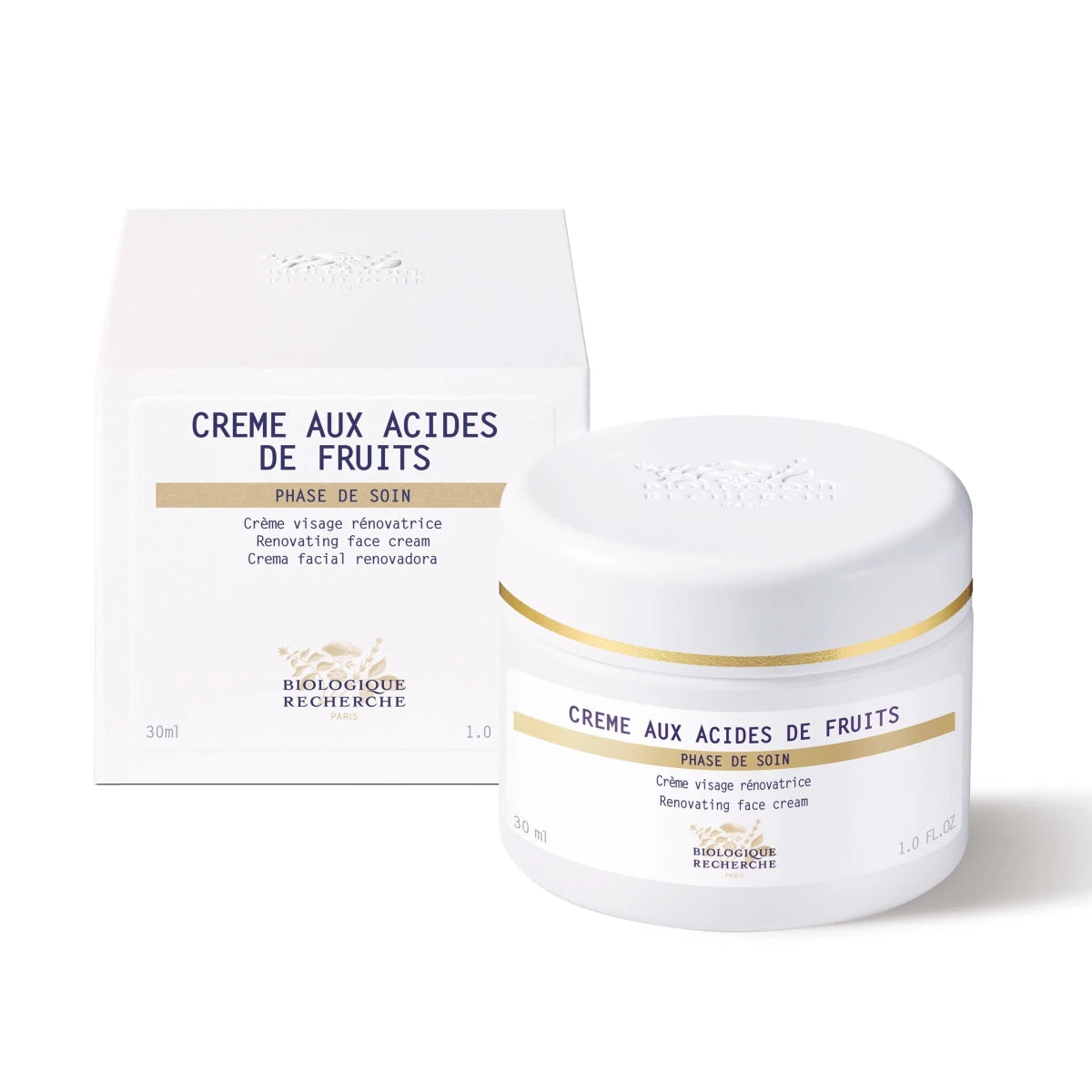 Jar of 'Crème aux Acides de Fruits' face cream with packaging on a white background