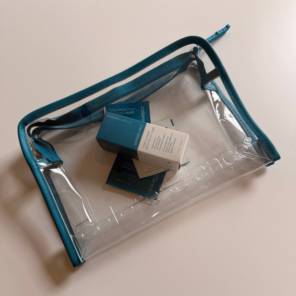 A complimentary travel size cleanser with pouch - Colorescience - Accessories-Aida Bicaj