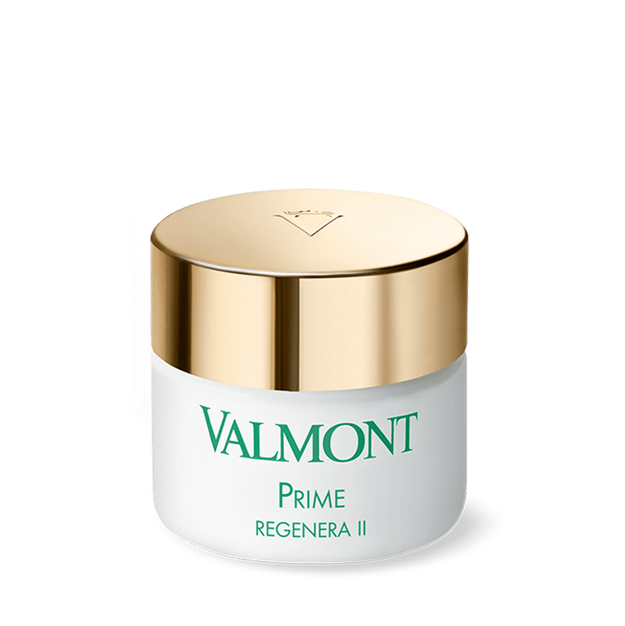 Valmont Prime Regenera II skincare cream jar with a white body and a metallic gold lid, featuring green branding text on a clean white background.