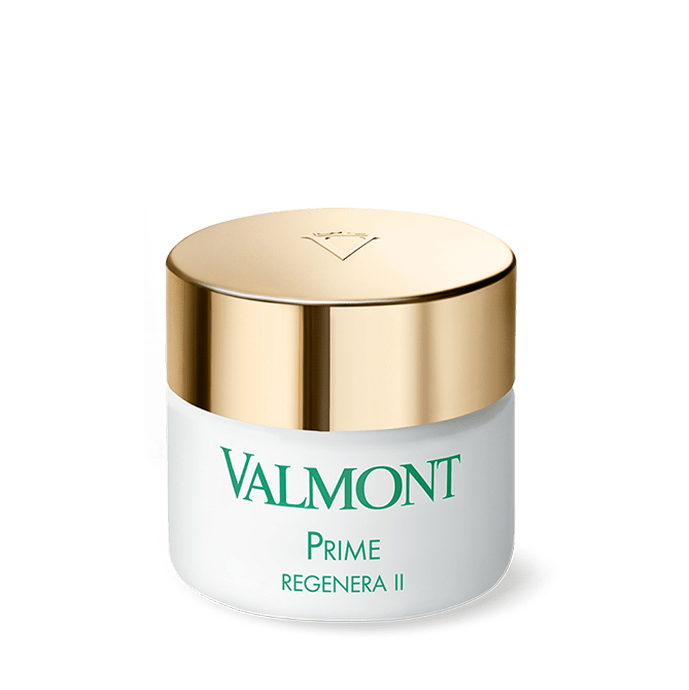 Valmont Prime Regenera II skincare cream jar with a white body and a metallic gold lid, featuring green branding text on a clean white background.